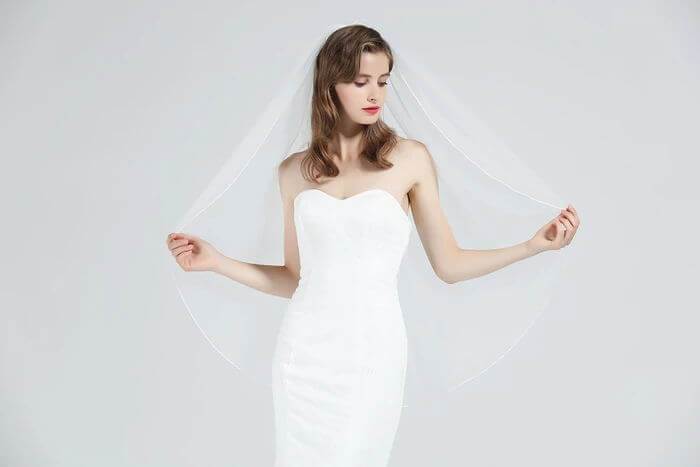 https://beautelicate.com/cdn/shop/products/veil-wedding-bridal-ivory-white-elbow-fingertip-knee-waltz-cathedral-chapel-length-1-tier-Long-short-3m-blusher-primer-bride-mental-comb-simple-costume-drops-communion-single-layer-pa_800x.jpg?v=1583140733