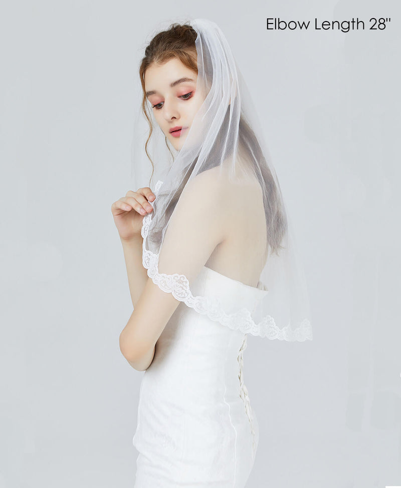 https://beautelicate.com/cdn/shop/products/veil-wedding-bridal-veil-brides-women-ivory-white-fingertip-elbow-waltz-knee-cathedral-2_800x.jpg?v=1583222390